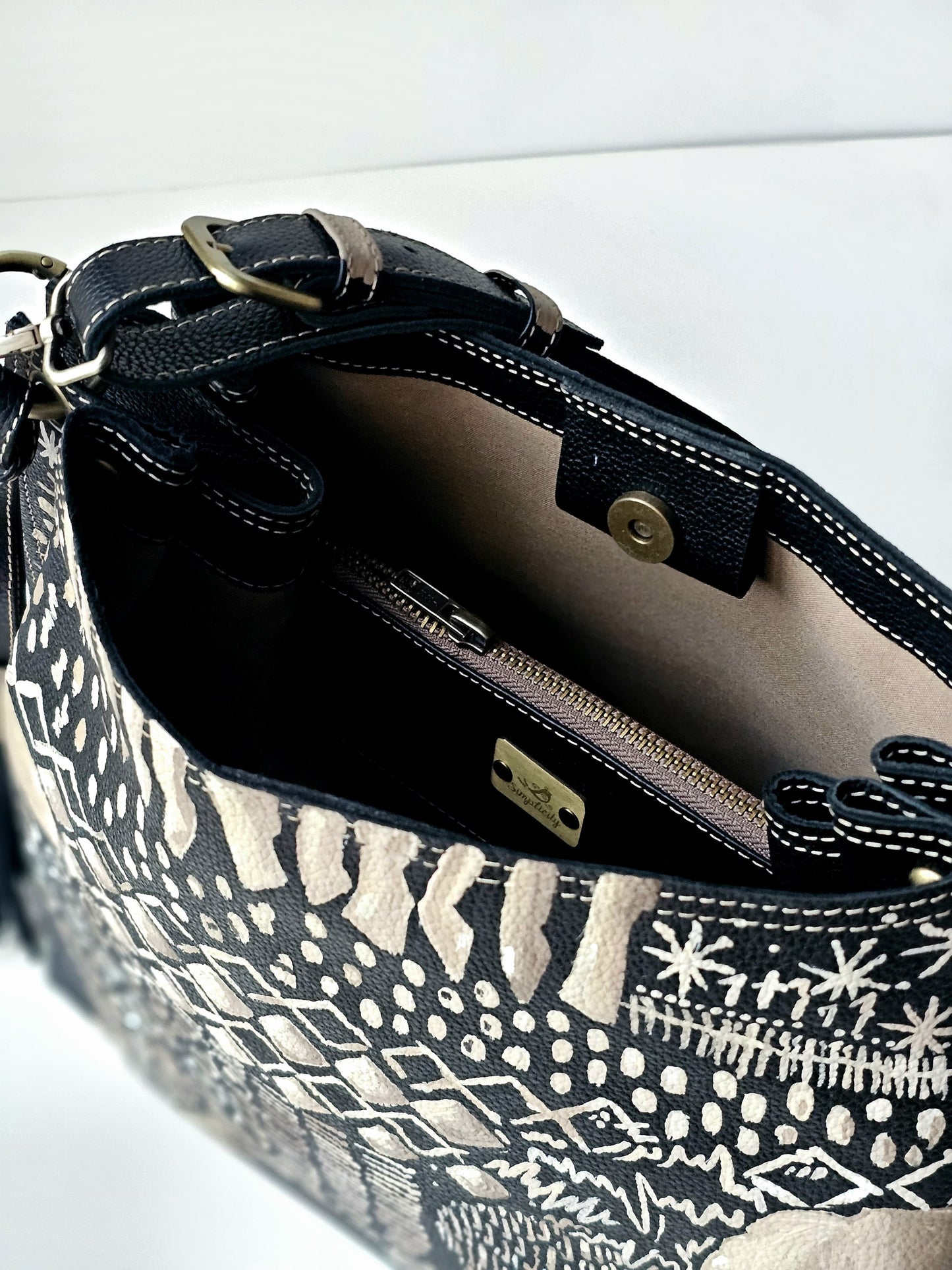 Leather bag with side tassel Black X Beige