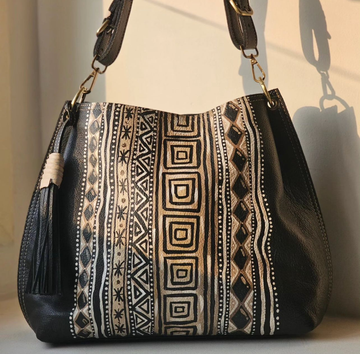 Leather bag with side tassel Black X Squares