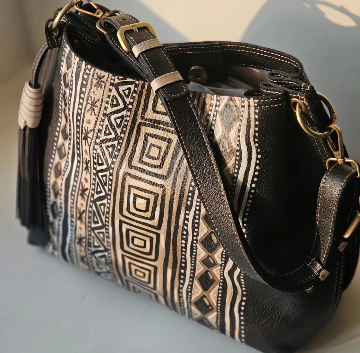 Leather bag with side tassel Black X Squares